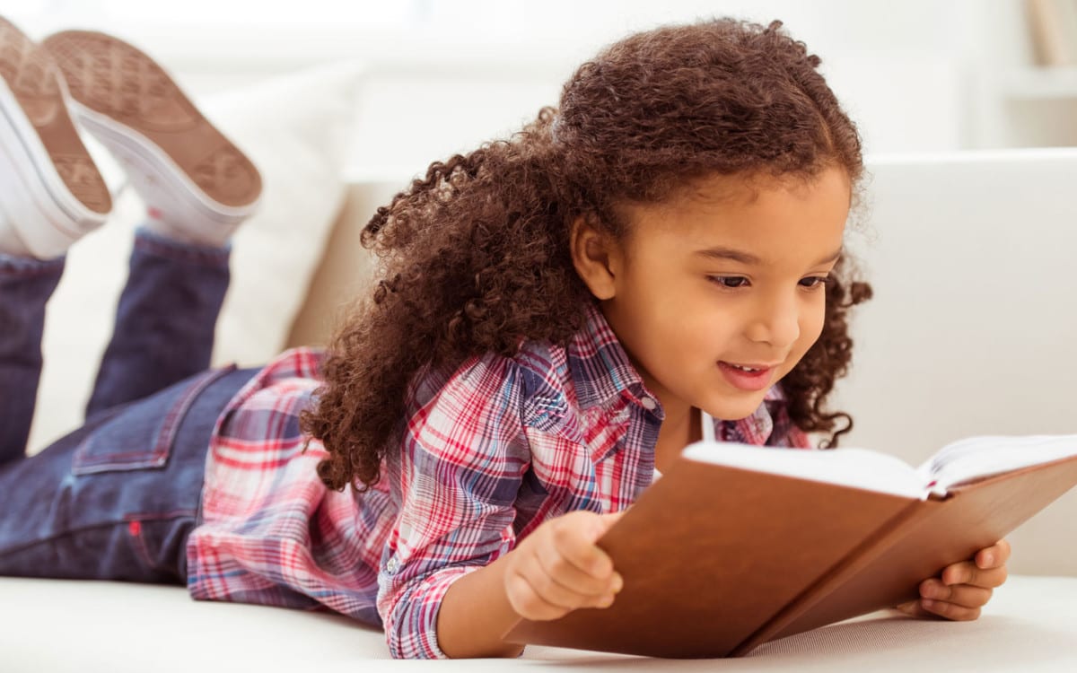 This African-American child can celebrate Black History Month through reading